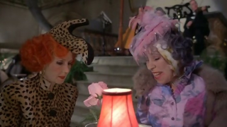 Alyssa’s mom in some movie scene with a stylish shoe on her head.